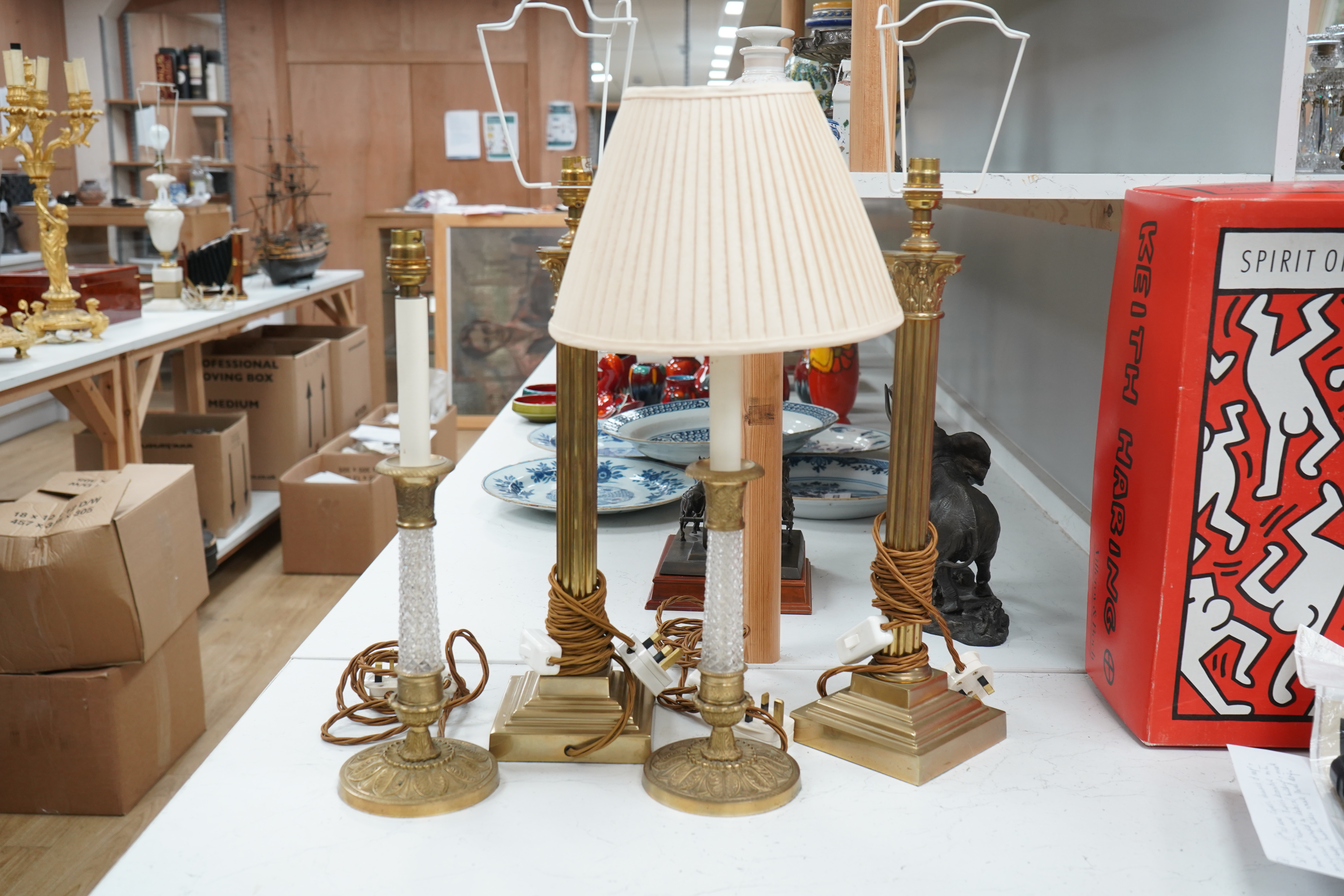 A pair of brass Corinthian column table lamps and another brass and glass pair, tallest 41.5cm. Condition - good, not tested